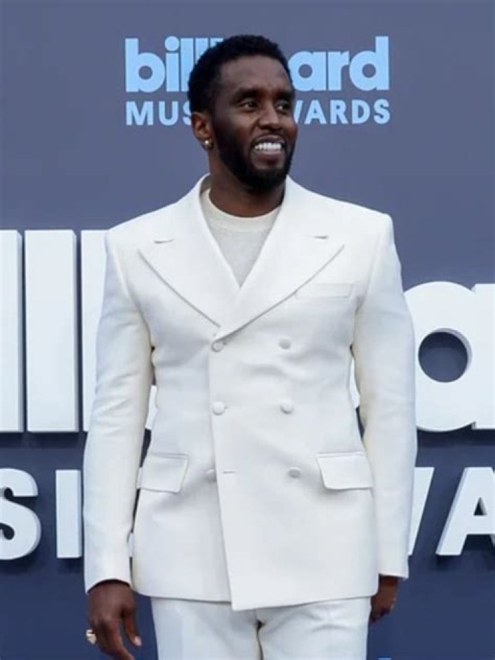 Elegance Personified: Diddy in White Suit